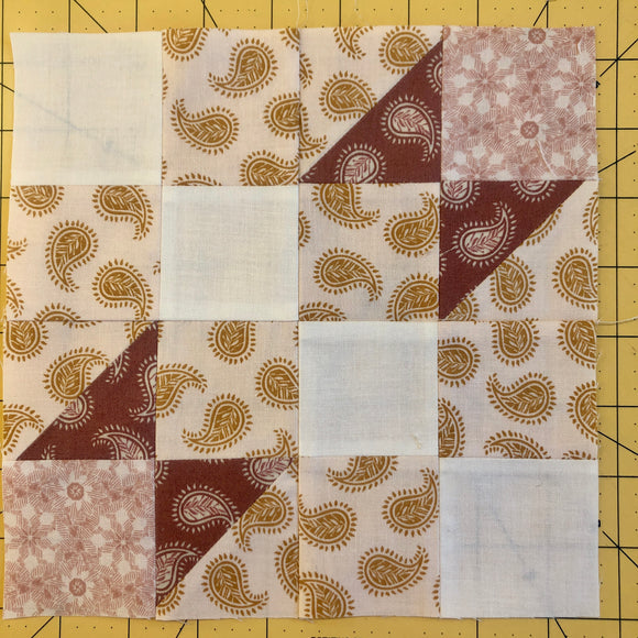 How to swirl quilt block seams
