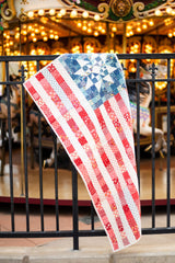 Sample of finished Oh Beautiful Flag Runner by Lori Holt featuring Americana fabric