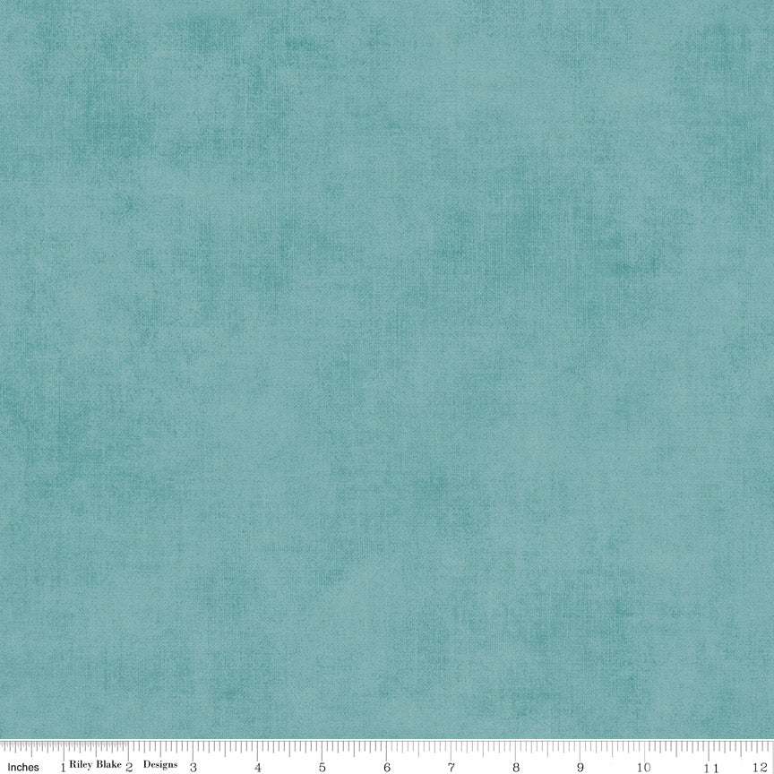 Shades Light Teal C200-LIGHTTEAL tonal teal quilting cotton by Riley Blake Designs with ruler showing print scale