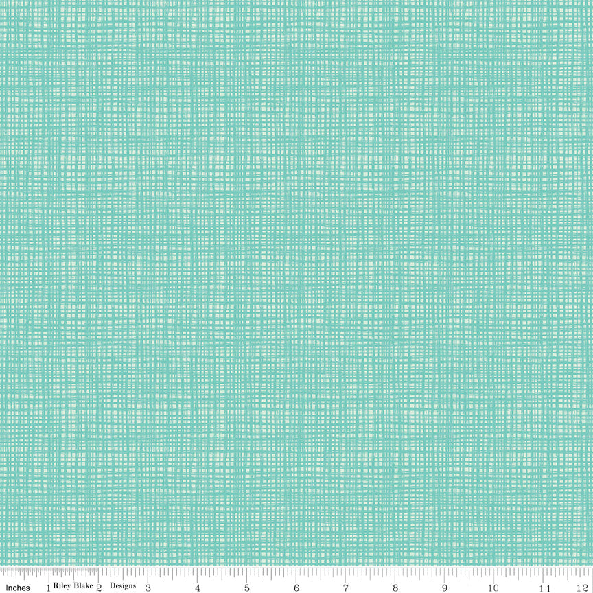 Aqua blue tone-on-tone fabric by Riley Blake Designs with a white sketched irregular grid pattern. Includes a 12-inch ruler at the bottom for scale.