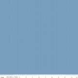 Riley Blake Designs C805-Washed Denim fabric featuring a tiny white micro dot pattern on a mid-tone blue background with a measurement ruler.