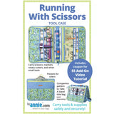 Front cover of the ByAnnie 'Running with Scissors' sewing pattern, showing a structured rectangular tool case unzipped and laid flat to display multiple clear and mesh pockets filled with colorful sewing notions and scissors.