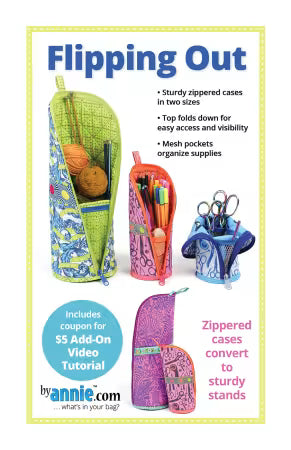 Front cover of the ByAnnie 'Flipping Out' sewing pattern, displaying two structured fabric cases in small and large sizes, with one zipped closed and the other unzipped with the top folded down to reveal a stable pen-cup holder.