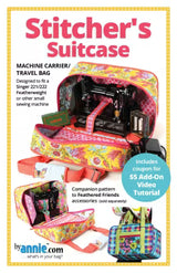 Front cover of the ByAnnie 'Stitcher's Suitcase' sewing pattern, showcasing a sturdy, rectangular quilted fabric travel bag with a wide-open zippered top revealing a vintage Singer Featherweight sewing machine tucked inside.