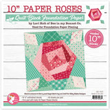 Lori Holt 10 inch Paper Roses Quilt Block Foundation Paper pad by It's Sew Emma, showing a sample rose block in pink and green fabrics.