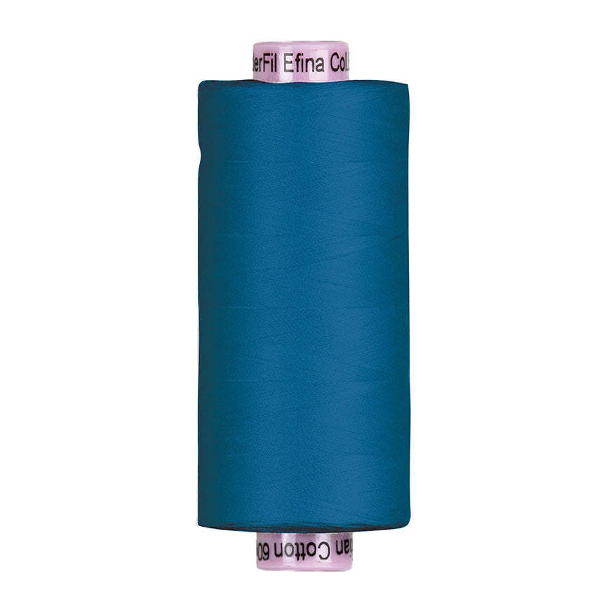 Spool of blue Riley Blake Confetti Cotton 60wt thread on a pink WonderFil Efina core, 1500 yards of premium Egyptian cotton.